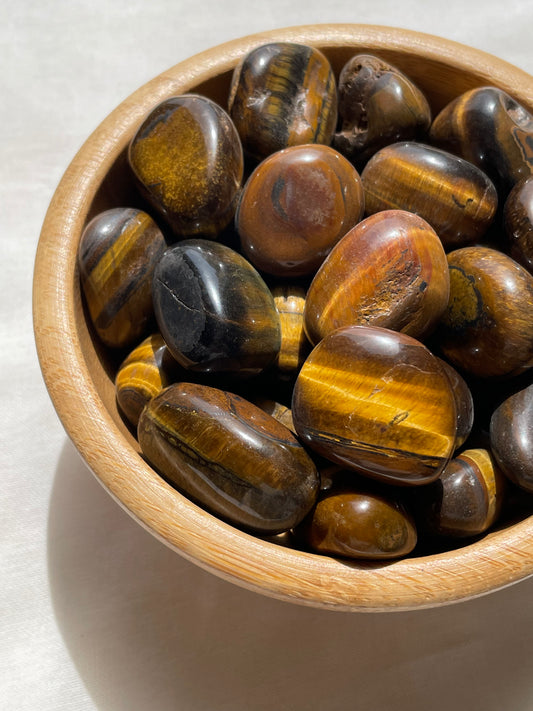 Tiger Eye Tumbles / عين النمر