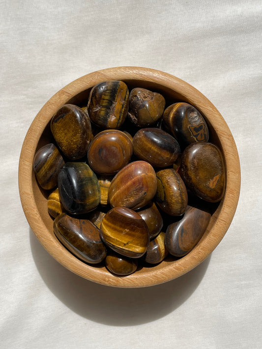 Tiger Eye Tumbles / عين النمر